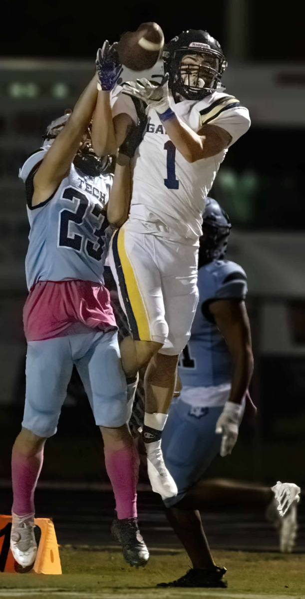 Nature Coast defender, 23, Allan Ho attempts to break up a pass for Land O’ Lakes receiver, 1, Kennen Ayala Friday night in Brooksville. Photo by JOE DiCRISTOFALO