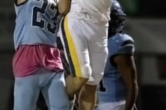 Nature Coast defender, 23, Allan Ho attempts to break up a pass for Land O’ Lakes receiver, 1, Kennen Ayala Friday night in Brooksville. Photo by JOE DiCRISTOFALO