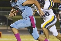 Nature Coast ,5, Jackson Hoyt finds room to run against Land O’ Lakes early in Friday night’s contest. Photo by JOE DiCRISTOFALO