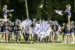 Friday night October 14, 2022 under the lights at Center, the Bears make their entrance for their Homecoming Game against Branford Buccaneers. Photo by Cheryl Clanton.