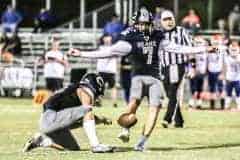 Friday night game against Branford, Central Bear No 14 Jr. Braden Joyner sets up ball for Central Bears No 7 Sr. Caden Bergantino to kick a Field Goal. Photo by Cheryl Clanton.