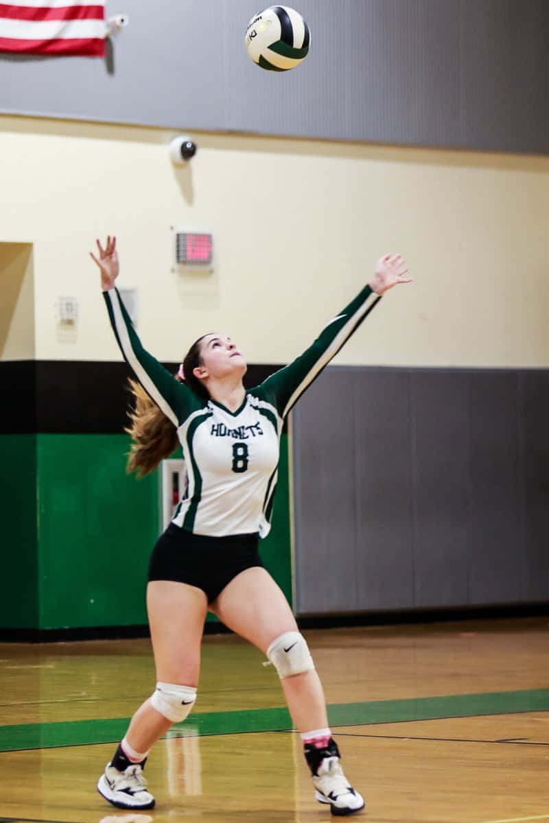 Lecanto Panthers vs Weeki Wachee Varsity Volleyball game Wednesday night October 5, 2022. Hornet #8 Sr. Morgan Maeder gets set to serve to the Panthers. Photo by Cheryl Clanton.