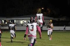 Eagles react to the win on Friday night Oct. 7, upon hearing the whistle.  Photo by Hanna Fox.