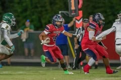 Eagle running back, 4, Connor Mccazzio finds running room against the Lecanto defense. Photo by JOE  DiCRISTOFALO