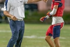 Springstead Head Coach Mike Garafalo details a play to ,1, Luca Garguilo during the first half of the win over Lecanto. Photo by JOE DiCRISTOFALO