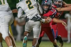 :Springstead High, Jadon James, 8,  wraps up a Lecanto runner Friday night in Spring Hill.Photo by JOSEPH DiCRISTOFALO