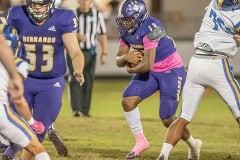 Hernando High running back , 13, Taurian Tucker follows blocking by ,53,Riley Nilsen during the Homecoming game against Crystal River. Photo by JOE DiCRISTOFALO