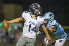 NCT , 50, Gabriel Rios harasses Central High QB ,14,Bradyn Joyner Friday at Nature Coast.  Photo by JOE DiCRISTOFALO