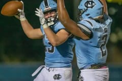 Nature Coast ,13, Brady Nowlin and ,2, Christian Cromer celebrate a score just before halftime in the NCT Homecoming game against Central High. Photo by JOE DiCRISTOFALO