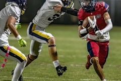 Springstead ,1, Luca Garguilo gains yardage around the end against the Land O’ Lakes defense.  Photo by JOE DiCRISTOFALO