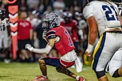 Springstead ,1, Luca Garguilo looks for running room after a pass reception during the first half against Land O’ Lakes.  Photo by JOE DiCRISTOFALO