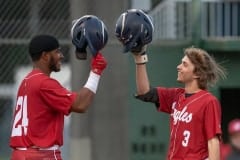 Springstead High School, 24, Jayden Garcia tips his helmet to Brendan Anderson, 3, after Anderson’s two run homer put the eagles ahead early in the game with Hernando High Tuesday in Brooksville. Photo by JOE DiCRISTOFALO