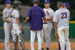 Hernando Head Coach, Tim Sims, has a mound conference with pitcher Carlos Gonzalez early in the game with visiting Springstead High. Photo by JOE DiCRISTOFALO