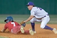 Hernando High shortstop, 22, Drew Vanalstine looks to the umpire for the out call which erased Springstead high’s ,7, Dalton Williams trying to stretch a hit into a double Tuesday in Brooksville. Photo by JOE DiCRISTOFALO