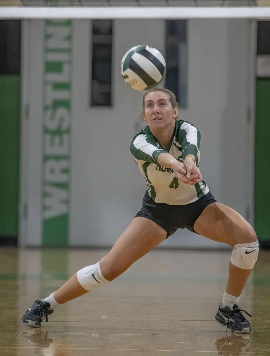 Weeki Wachee ,4, Allora Murray concentrates on digging a serve during match versus Central High. Photo by JOE DiCRISTOFALO