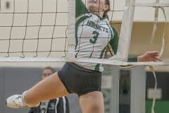 Weeki Wachee ,3, Courtney Mcdermott slices a toss court kill attempt versus Central High. Photo by JOE DiCRISTOFALO