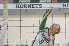 Weeki Wachee ,9, Trinity Garrison hits during the match with Central High , 7,Sierra Becker. Photo by JOE DiCRISTOFALO