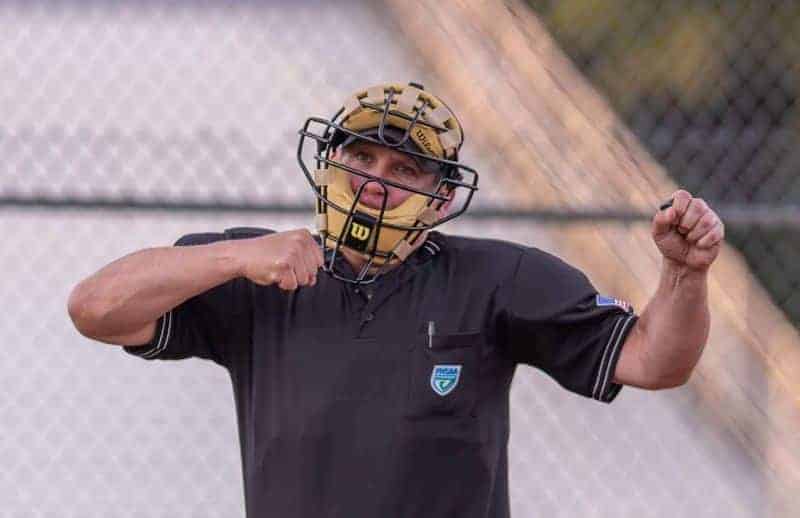 Home plate umpire, Todd Paskiet, struck this pose seventeen times as Hernando pitcher Michael Savarese got all but five Satellite batters he faced by strikeout. Photo by JOE DiCRISTOFALO