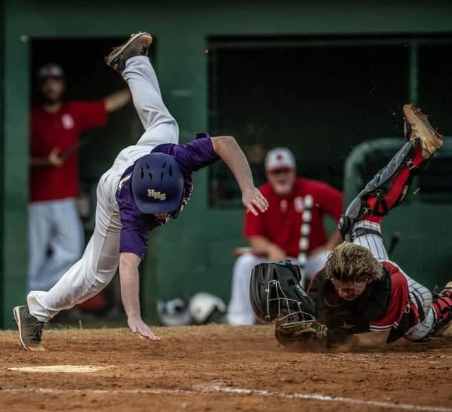 Hernando High TJ Rodier took the hard way to home through a tag attempt by the Satellite catcher in Tuesday Night action in Brooksville. Rodier scored as the ball came loose from the catchers glove on the play.  Photo by JOE DiCRISTOFALO