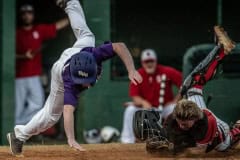 Hernando High TJ Rodier took the hard way to home through a tag attempt by the Satellite catcher in Tuesday Night action in Brooksville. Rodier scored as the ball came loose from the catchers glove on the play.  Photo by JOE DiCRISTOFALO