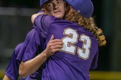 Hernando pitcher, Michael Savarese gets congratulated by team mate, 23, Tyson Morgan after the 6-0 win over Satellite High. Hernando travels to North Marion Friday night to take on the top seeded Colts in a Regional semi-final game.  Photo by JOE DiCRISTOFALO