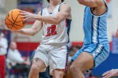 Springstead High, 22, Adrian D’Acunto looks for a way around a Berkeley Prep defender Wednesday 12/21/2022  in the 8th Annual Greg O’Connell Shootout at Springstead High.  Photo by JOE DiCRISTOFALO