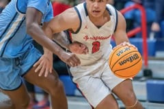 Springstead High, 2, Quinn Lenimon tries ta advance past a Berkeley Prep defender Wednesday 12/21/22 in the 8th Annual Greg O’Connell Shootout at Springstead High.  Photo by JOE DiCRISTOFALO