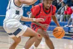 Springstead High, 3, Divine Torain tries to work around Central High ,21, David Villarroel Friday night at Central High. Photo by JOE DiCRISTOFALO