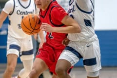 Springstead High, 12, Austin Nicholson attempts to work past Central High ,00, Tylor Daniel Friday night. Photo by JOE DiCRISTOFALO