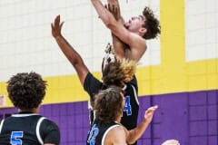 Leopards #10 senior Michael Savarese goes for the shot in the mist of Sharks Tuesday night to put points on the board. Photo by Cheryl Clanton.