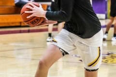 Tuesday night leopard #4 senior Will Tigue  warms up for District Quarterfinal against Anclote Sharks. Photo by Cheryl Clanton.