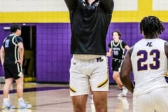 Tuesday night leopard #10 senior Michael Savarese warms up for District Quarterfinal against Anclote Sharks. Photo by Cheryl Clanton.