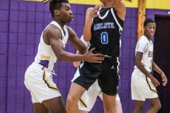 Tuesday nights game Leopards #0 Junior Liandre Wright goes on the defense against Anclote to stop the pass. Photo by Cheryl Clanton.