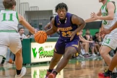 Hernando High ,23, Jesse Stewart tries to split the Weeki Wachee defense Tuesday night at Weeki Wachee High. Photo by JOE DiCRISTOFALO