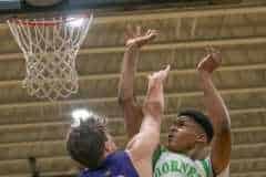 Weeki Wachee High, 14, goes over the defense by Hernando High, 10, Michael Savarese Tuesday 1/24/23 at Weeki Wachee High. Photo by JOE DiCRISTOFALO