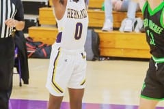Hernando Leopard Junior #0 Liandra Wright attempts a pass to a fellow team mate Tuesday 12/13/2022 night against the Hornets. Photo by Cheryl Clanton.