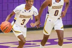 Hernando Leopards Junior #3 Josiah Wright and Junior #0 Liandre Wright bringing ball back in to play against the Weeki Wachee Hornets. Photo by Cheryl Clanton.