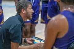 Hernando High Head Coach, Travis Bruns outlines strategy to his players during the game with Nature Coast Tech Tuesday night. Photo by JOE DiCRISTOFALO