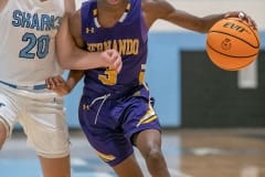 Hernando High, 3, Josiah Wright tries to penetrate to the basket while guarded by NCT, 20, Konnor Kramer. Photo by JOE DiCRISTOFALO