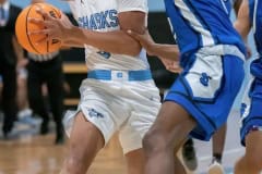 Nature Coast’s ,3, Luke Sanders looks for an opening in the Sebring High School defense  Thursday in the Final Game of the Nature Coast Christmas Tournament. Sebring won the game 444-32 to secure the Championship of the A bracket. Photo by JOE DiCRISTOFALO