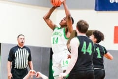 Thursday night's game against Gulf High School, Hornet #14 Junior Isaac Priester takes it up for the score.  Photo by Cheryl Clanton.