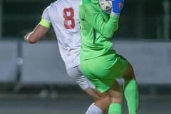 Nature Coast keeper , Cole Pretorius, snatches a loose ball away from the advance of Springstead’s Murphy Anderson, 8 Friday at NCT. Photo by JOE DiCRISTOFALO.