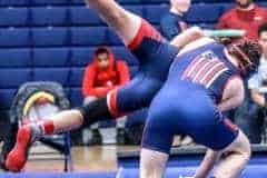 Eagles wrestler Josh slams Fivay to the mat in Friday's District Duels. Photos by Cheryl Clanton.