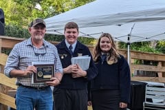 Gene Chaires, Ranch Hand, receives the Outstanding Achievement Award