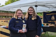 Gabby presents the Star Chapter Farmer Award to Katie Eudy.