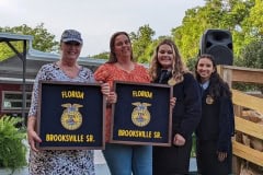 Teri Sellers and Michelle King  receive the BSFFA Pride Award.