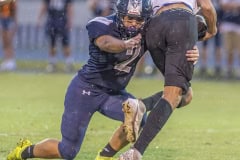 Central High, 2,Isaiah Beutler wraps up Anclote High’s ,2, Dominic Marotta in the home game with Anclote High.Photo by JOE DiCRISTOFALO