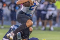 Central High, 2,Isaiah Beutler wraps up Anclote High’s ,2, Dominic Marotta in the home game with Anclote High.Photo by JOE DiCRISTOFALO