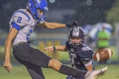 Anclote High’s ,2, Dominic Marotta gets off a punt under pressure Friday night at Central High. Photo by JOE DiCRISTOFALO