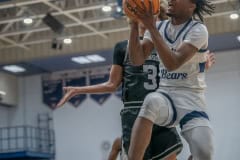 Central High, 1, Jaleel Thrower fits an open lane to the basket Thursday in the home 68-33 Regional Quarterfinal win over visiting Robinson High. Photo by JOE DiCRISTOFALO